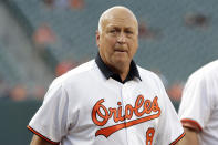 FILE - In this Aug. 9, 2019, file photo, former Baltimore Orioles infielder Cal Ripken Jr. attends an on-field ceremony honoring the 1989 Orioles team prior to a baseball game against the Houston Astros in Baltimore. It has been 25 years since Ripken broke Lou Gehrig's major league record for consecutive games played, a feat the Orioles star punctuated with an unforgettable lap around Camden Yards in the middle of his 2,131st successive start. (AP Photo/Julio Cortez, File)