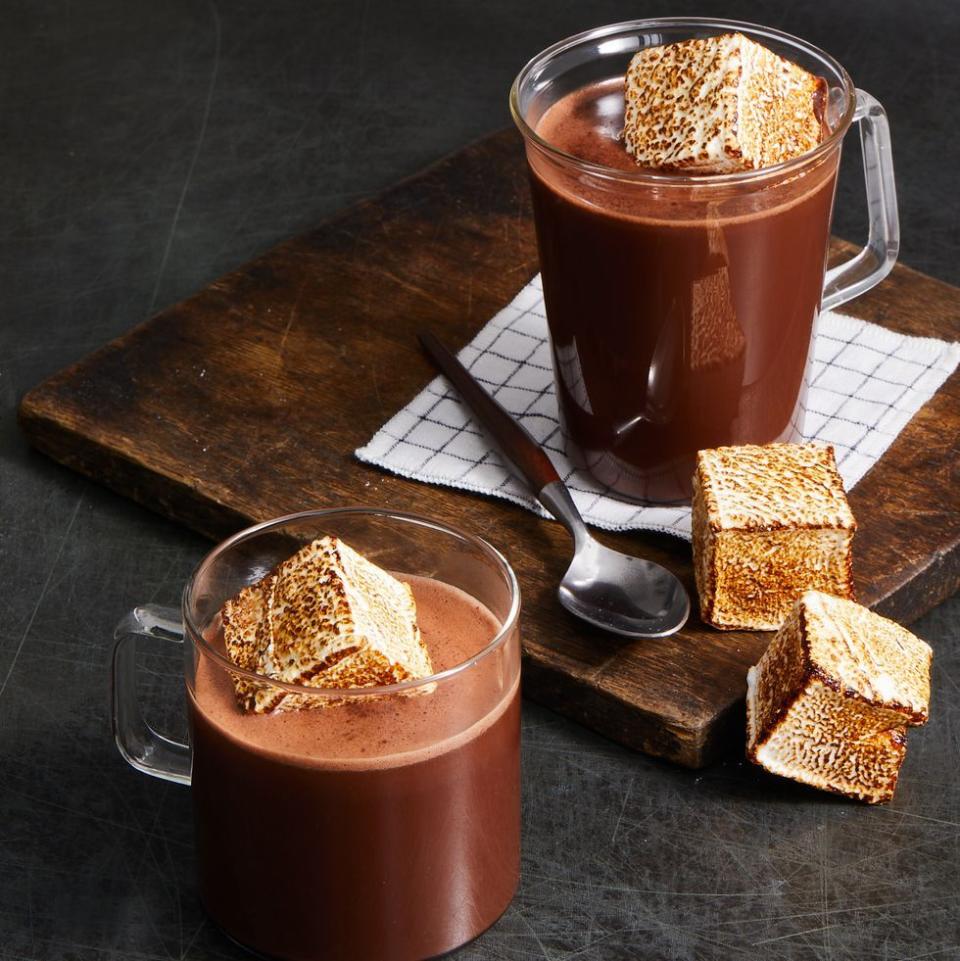 <p>This warming fall drink topped with a toasted marshmallow (and spiked with rum or bourbon!) doubles as dessert.</p><p><a href="https://www.goodhousekeeping.com/food-recipes/a34728624/spiked-hot-chocolate-recipe/" rel="nofollow noopener" target="_blank" data-ylk="slk:Get the recipe for Spiked Hot Chocolate »;elm:context_link;itc:0;sec:content-canvas" class="link "><em>Get the recipe for Spiked Hot Chocolate »</em></a></p>