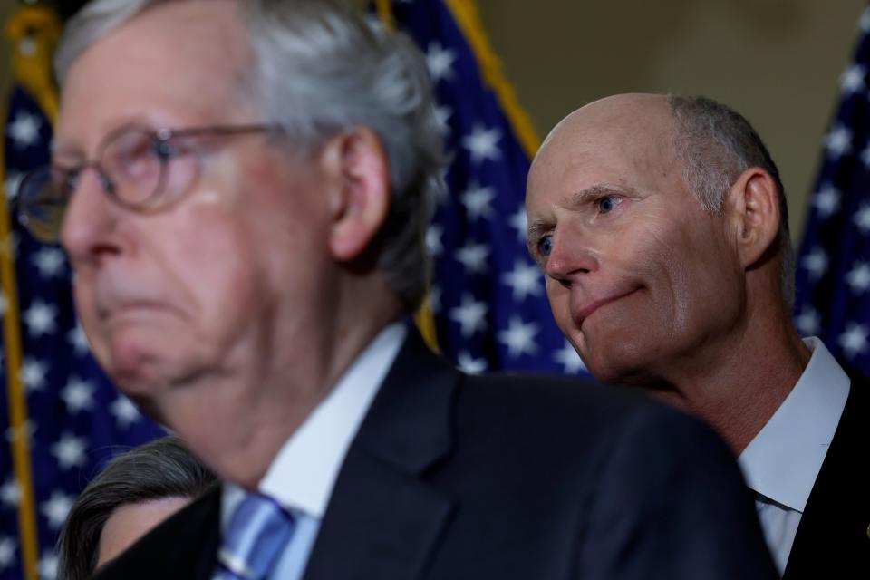 WASHINGTON, DC - Florida GOP Sen. Rick Scott (right) and Senate Minority Leader Mitch McConnell (R-KY) listen during a news conference after a policy luncheon with Senate Republicans at the U.S. Capitol Building on Sept. 7, 2022. (Photo by Anna Moneymaker/Getty Images)