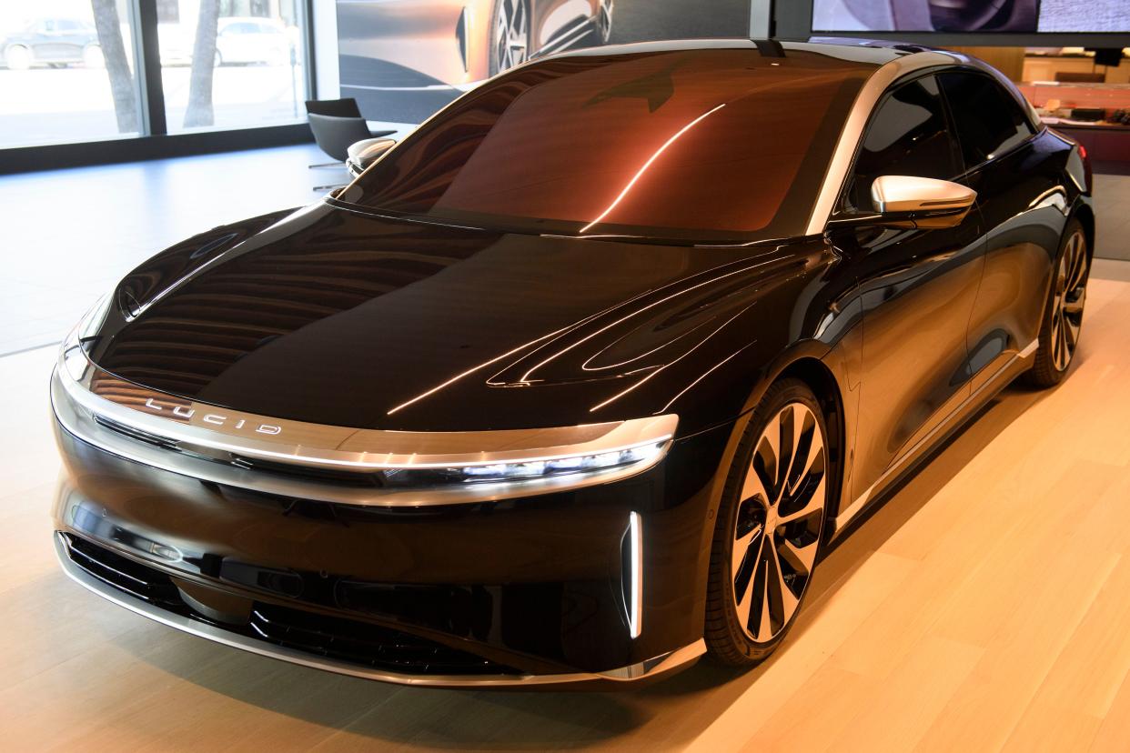 A Lucid Air Grand Touring electric luxury car is displayed at the Lucid Motors Inc. studio and service center on February 25, 2021 in Beverly Hills, California. - The California-based electric vehicle company announced this month that it plans to go public via a merger with a company that values it at $24 billion, with the pure-electric luxury sedan Lucid Air launching in 2021. (Photo by Patrick T. FALLON / AFP) (Photo by PATRICK T. FALLON/AFP via Getty Images)