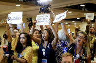 <p>Protesters yell as DNC Chairwoman, Debbie Wasserman Schultz, D-Fla., arrives for a Florida delegation breakfast, July 25, 2016, in Philadelphia, during the first day of the Democratic National Convention. (Photo: Matt Slocum/AP)</p>