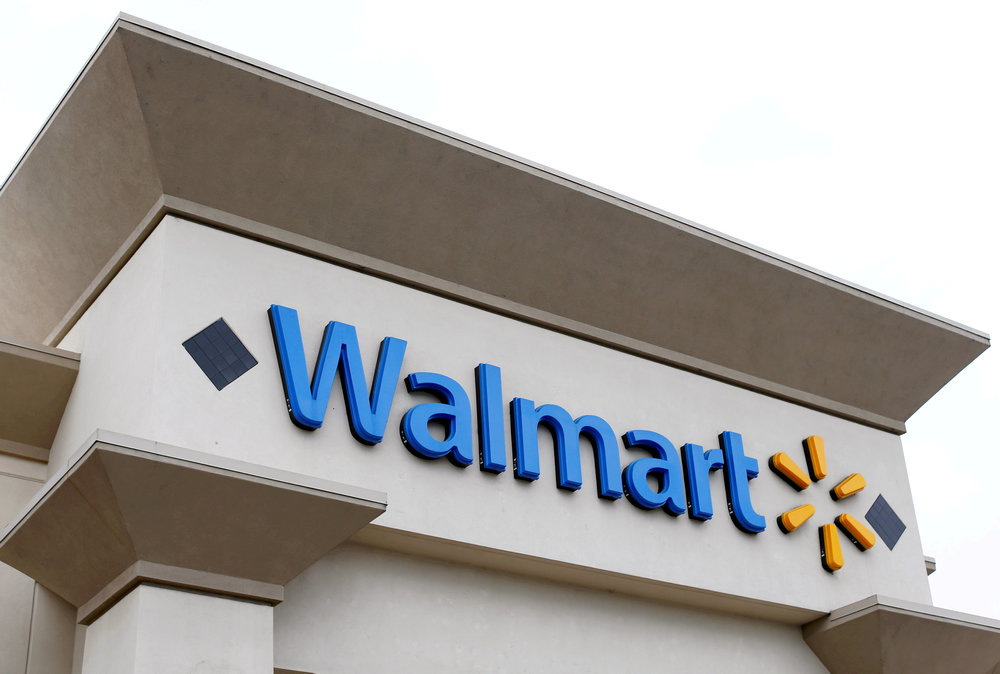 US retail giant Walmart will offer free college tuition and books to its 1.5 million employees in a bid to attract and retain workers in a tight labour market. — Reuters pic