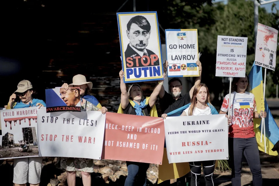 Members of the Ukrainian community in South Africa hold placards as they protest during the visit of Russia Minister of Foreign Affairs of Sergey Lavrov at the Department of International Relations and Cooperation in Pretoria, South Africa, January 23, 2023. / Credit: AFP via Getty