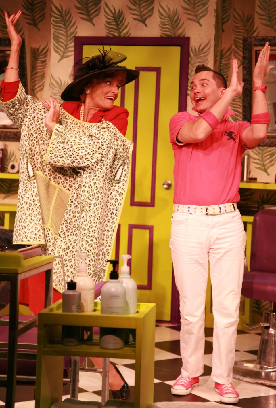 Lisa McMillan, left, and Michael Kevin Baldwin in the 2011 production of the comedy “Shear Madness” at Florida Studio Theatre. McMillan returns this summer.