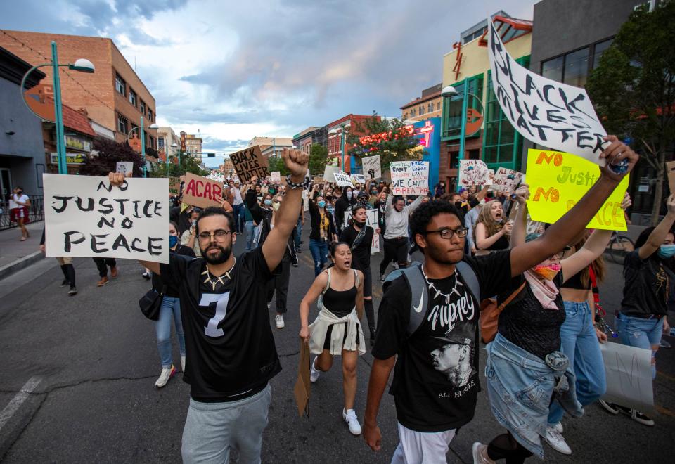 Demonstrators in downtown Albuquerque, N.M., protest the death of George Floyd in 2020.