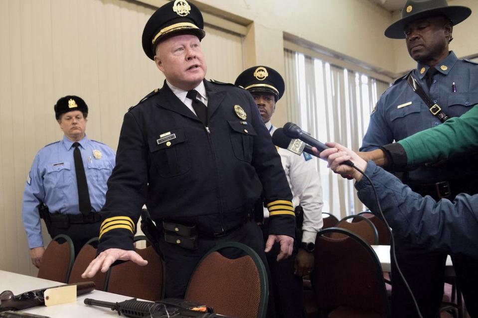 In this Dec. 23, 2017, file photo, interim St. Louis Police Chief Lawrence O’Toole, center, speaks to reporters in St. Louis. (Sid Hastings/St. Louis Post-Dispatch via AP, File)