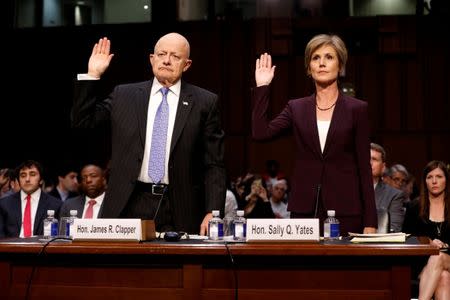 Former Acting Attorney General Sally Yates and former Director of National Intelligence James Clapper are sworn in before the Senate Judiciary Committee on Capitol Hill, Washington, D.C., U.S. May 8, 2017. REUTERS/Aaron P. Bernstein