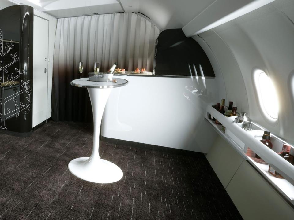 Inside the private jet with a lounge.