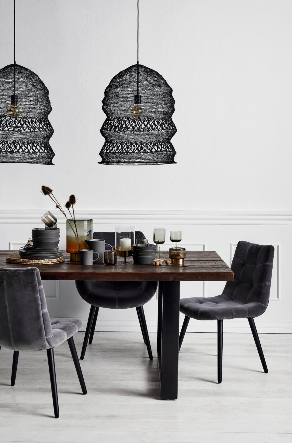 <p> Kitchens tend to benefit from plenty of natural light, so make a great space in the home to try out an atmospheric dark scheme or the latest kitchen trend.&#xA0; </p> <p> A dark pendant light is a great way to create a graphic contrast in your dining space &#x2013; and if you find that it doesn&apos;t work, after all, pendants are easy to replace. Choose an organic-inspired mesh design for added texture.&#xA0; </p>