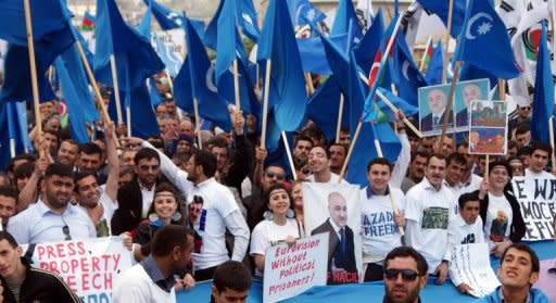 Azerbaijani opposition supporters hold a protest rally in Baku April 22, against Europe's decision to stage next month's Eurovision song contest in the Caucasus nation despite its poor human rights record