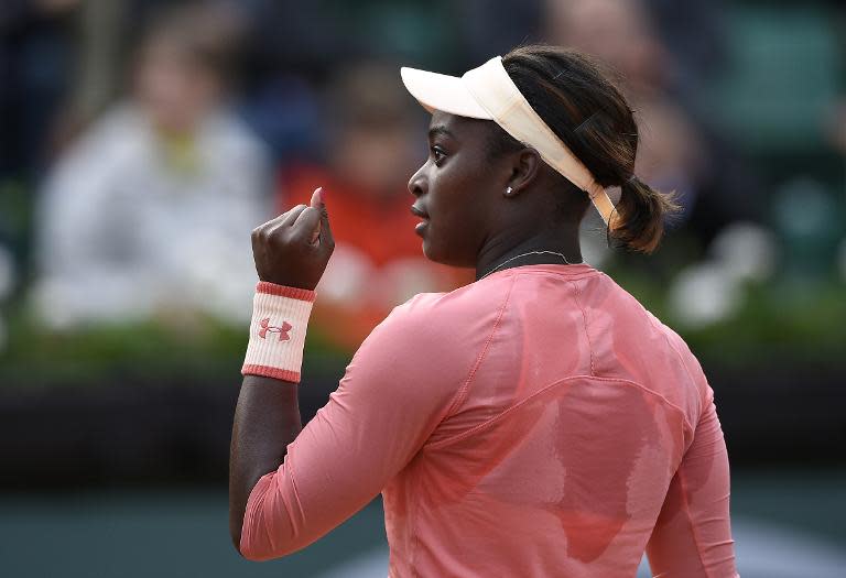 Sloane Stephens reacts during her match against Venus Williams during the women's first round at the Roland Garros 2015 French Tennis Open in Paris on May 25, 2015