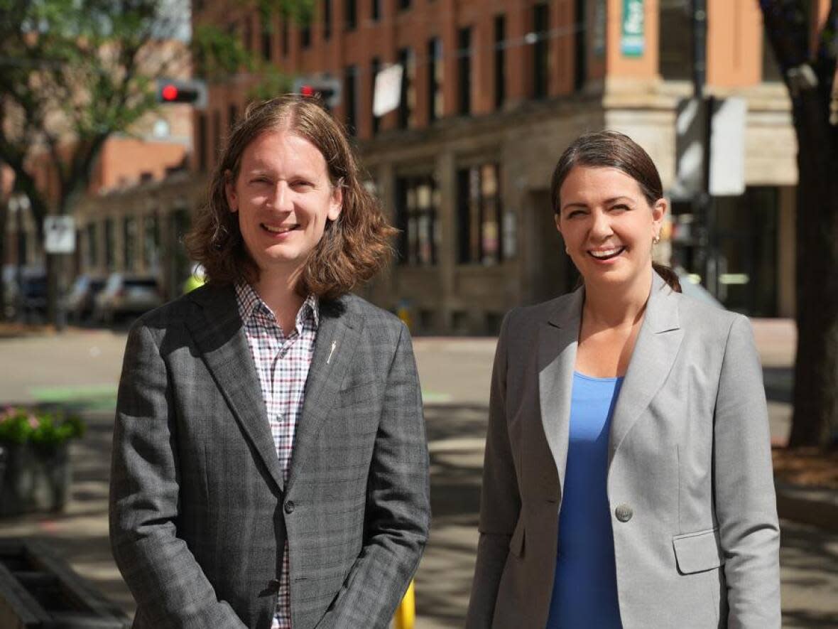 Service Alberta Minister Nate Glubish poses with UCP leadership candidate Danielle Smith in a photo released by Smith's campaign on Monday, Aug. 8. (Danielle Smith Campaign - image credit)