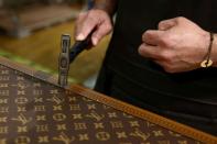 FILE PHOTO: Manufacture of luxury Louis Vuitton trunks in Asnieres-sur-Seine near Paris