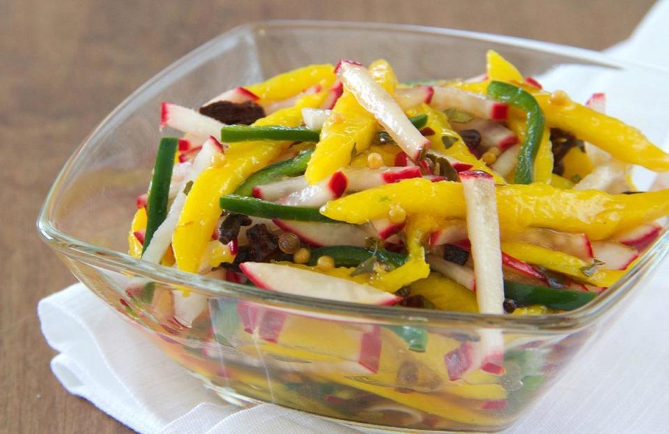 <p>This pickled mango radish slaw can be prepared in just 20 minutes and requires only seven ingredients. Serve it as a side dish or pair it with some chips for a <a href="https://www.thedailymeal.com/easy-summer-salsa-and-dip-gallery?referrer=yahoo&category=beauty_food&include_utm=1&utm_medium=referral&utm_source=yahoo&utm_campaign=feed" rel="nofollow noopener" target="_blank" data-ylk="slk:delicious summer salsa;elm:context_link;itc:0;sec:content-canvas" class="link ">delicious summer salsa</a>.</p> <p><a href="https://www.thedailymeal.com/recipes/pickled-mango-radish-slaw-recipe?referrer=yahoo&category=beauty_food&include_utm=1&utm_medium=referral&utm_source=yahoo&utm_campaign=feed" rel="nofollow noopener" target="_blank" data-ylk="slk:For the Pickled Mango Radish Slaw recipe, click here;elm:context_link;itc:0;sec:content-canvas" class="link ">For the Pickled Mango Radish Slaw recipe, click here</a>.</p>