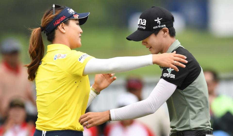 July 1, 2018; Kildeer, IL, USA; So Yeon Ryu (left) hugs Sung Hyun Park (right) after the second playoff hole during the final round of the KPMG Women's PGA Championship golf tournament at Kemper Lakes Golf Club. Mandatory Credit: Thomas J. Russo-USA TODAY Sports