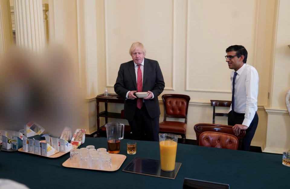 Boris Johnson and Rishi Sunak surrounded by sandwiches and drinks on 19 June, 2020. (Cabinet Office)