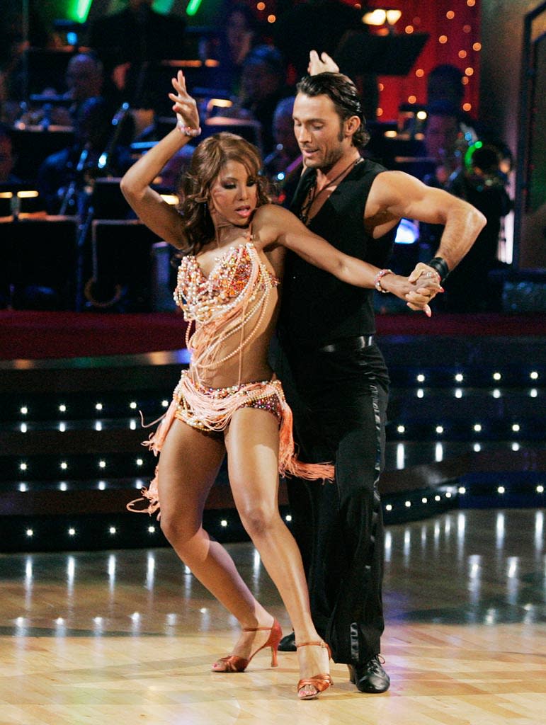 Toni Braxton and Alec Mazo perform a dance on the seventh season of Dancing with the Stars.