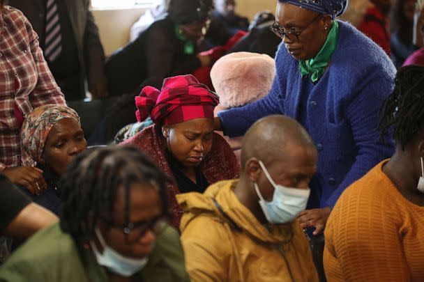 PHOTO: Mourners attend a service at the Assembly of God Church in Scenery Park, East London, South Africa, June 27, 2022. South African authorities are seeking answers after more than 20 teenagers died in a mysterious weekend incident at a nightclub. (AP)
