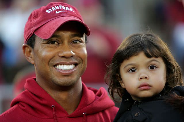 <p>Ezra Shaw/Getty</p> Tiger Woods and Sam Woods in 2009