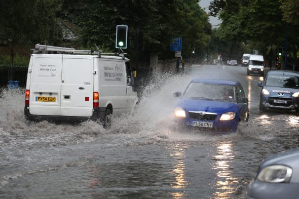 downpours spark flood warnings