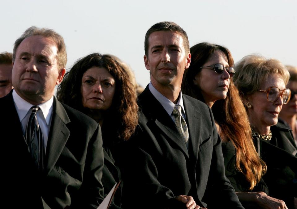 Michael Reagan, his wife, Ron Reagan, Patti Davis and former first lady Nancy Reagan attend the interment ceremony as former President Ronald Reagan is laid to rest at the Ronald Reagan Presidential Library June 11, 2004 in Simi Valley, California (Getty Images)