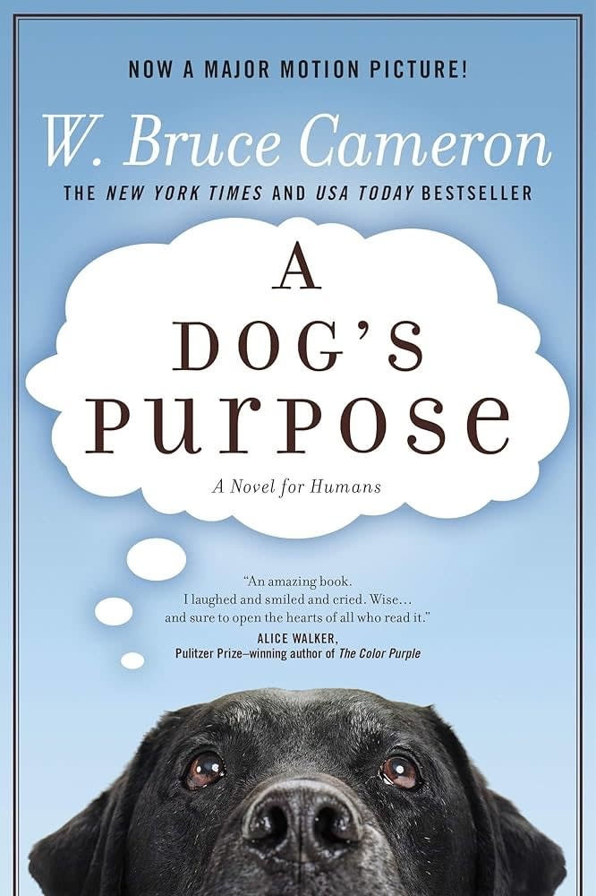 A book cover with the title "A Dog's Purpose", featuring an up-close photo of a dog's face looking at the camera
