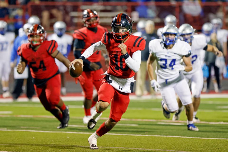 Del City quarterback River Warren (10) carries the ball for a touchdown during a high school football game between Guthrie and Del City in the quarterfinals of the Class 5A playoffs in Del City, Okla., Friday, Nov. 17, 2023.