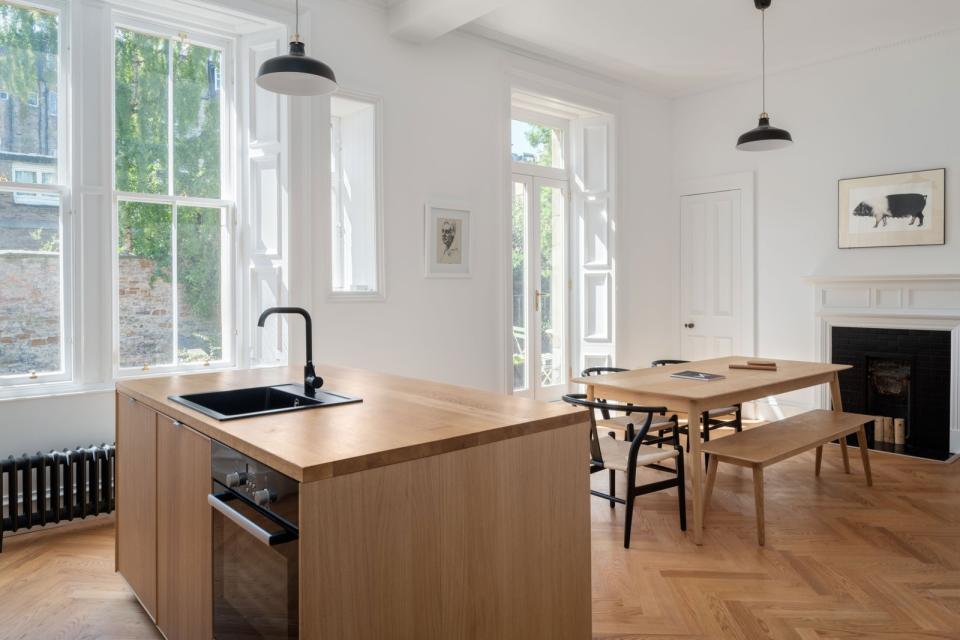 Luke McClelland opened up the tiny, old kitchen to the dining room to create one airy space. ZAC and ZAC