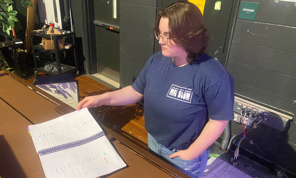 Emma Bettencourt, who plays the role Emma, goes over lines before making their entrance during a rehearsal at Fairhaven High School.