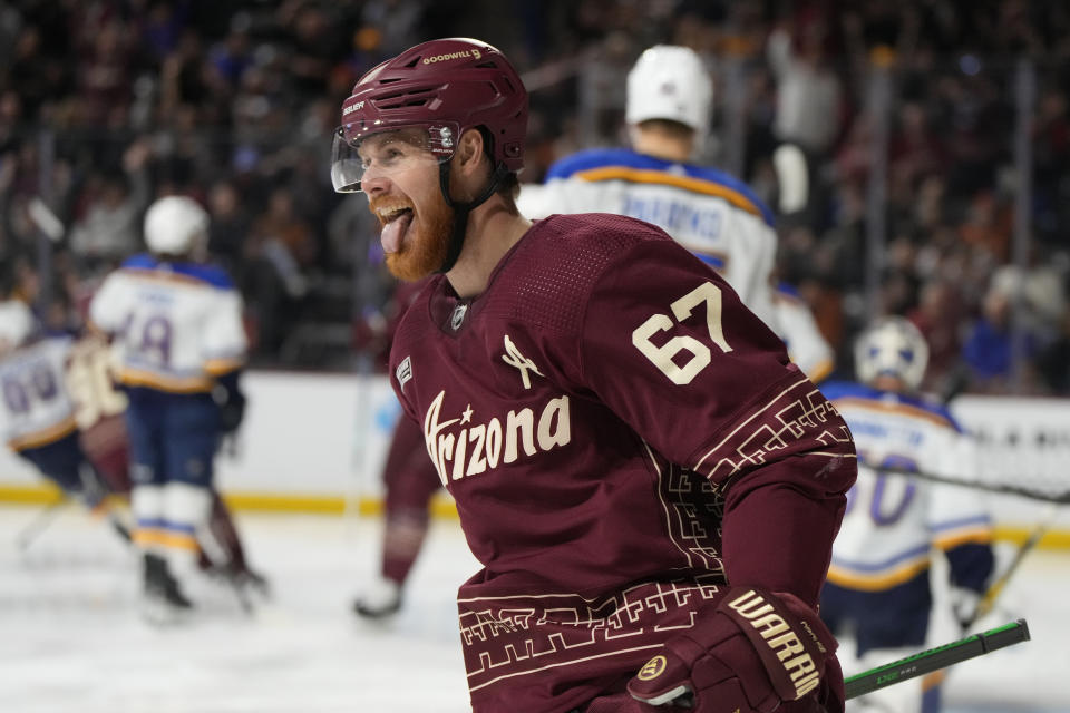 Arizona Coyotes left wing Lawson Crouse reacts after scoring against the St. Louis Blues in the second period during an NHL hockey game, Wednesday, Nov. 22, 2023, in Tempe, Ariz. (AP Photo/Rick Scuteri)