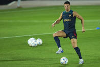 Portugal's Cristiano Ronaldo plays the ball with teammates during his team training session at the World Cup in Doha, Qatar, Thursday, Dec. 8, 2022. (AP Photo/Francisco Seco)