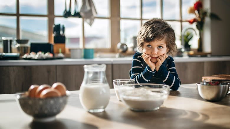 Jug of milk and boy