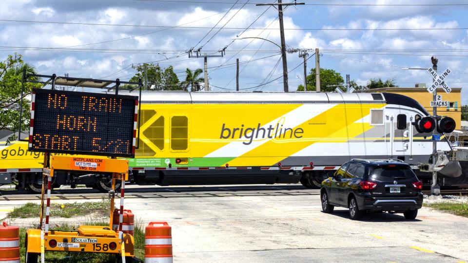 A Virgin Trains USA train - formerly known as Brightline - passes through West Palm Beach.