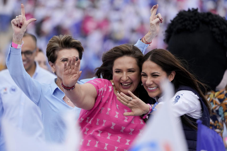 FILE - Opposition presidential candidate Xóchitl Galvez waves during her opening campaign rally in Irapuato, Mexico, March 1, 2024. If elected, the businesswoman has promised to permanently close refineries in Nuevo Leon and Tamaulipas states within the first six months of her presidency, and has proposed transforming the country’s state-run oil and gas company into one that could also produce electricity using renewable sources such as geothermal energy. (AP Photo/Fernando Llano, File)