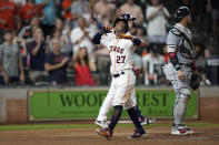 Houston Astros' Jose Altuve (27) celebrates after hitting a home run against the Chicago White Sox during the sixth inning of a baseball game Thursday, June 17, 2021, in Houston. (AP Photo/David J. Phillip)