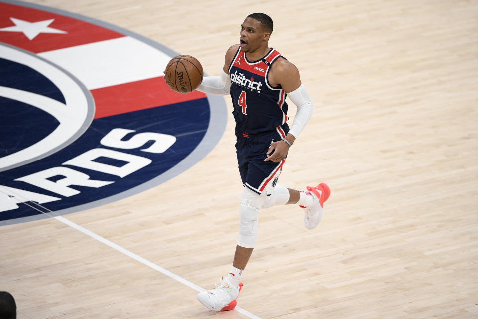 Washington Wizards guard Russell Westbrook brings the ball up during the first half of the team's NBA basketball game against the Cleveland Cavaliers, Friday, May 14, 2021, in Washington. (AP Photo/Nick Wass)