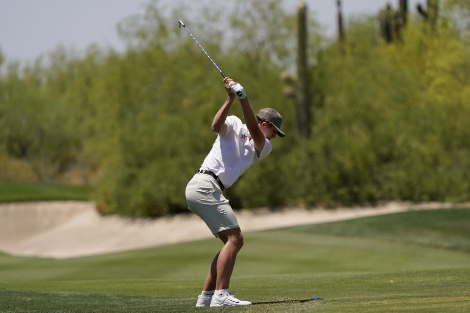 Vanderbilt golfer Gordon Sargent hits from the their fairway during the final round of the NCAA college men's stroke play golf championship, Monday, May 30, 2022, in Scottsdale, Ariz. (AP Photo/Matt York)