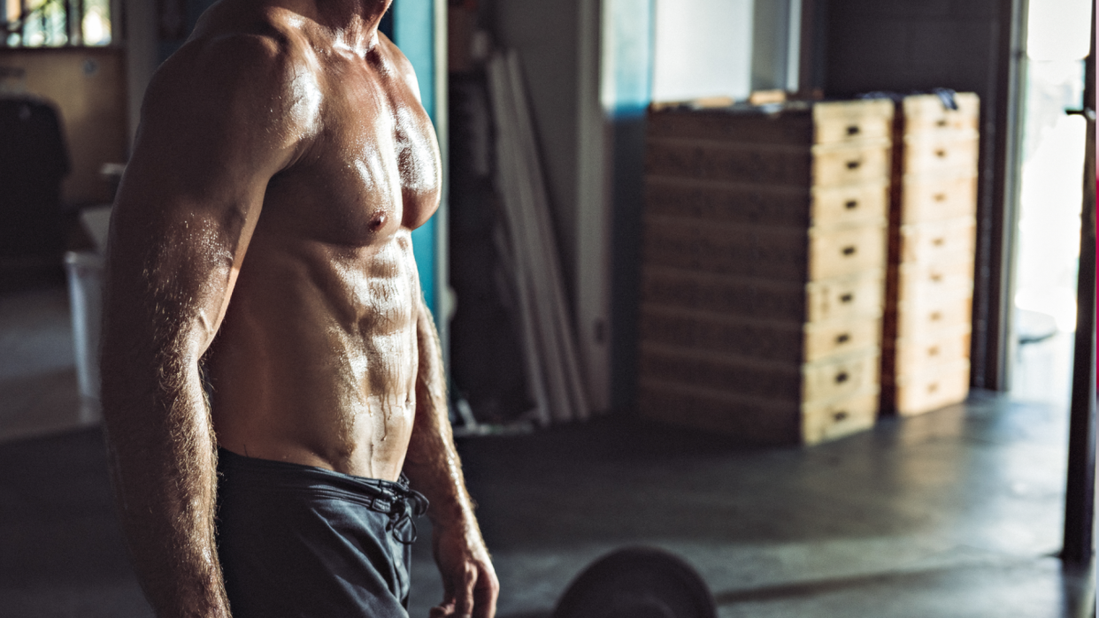  Man topless sweaty after a workout 