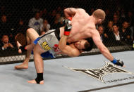 Alan Belcher versus Yushin Okami during their middleweight fight at UFC 155 on December 29, 2012 at MGM Grand Garden Arena in Las Vegas, Nevada. (Photo by Josh Hedges/Zuffa LLC/Zuffa LLC via Getty Images)