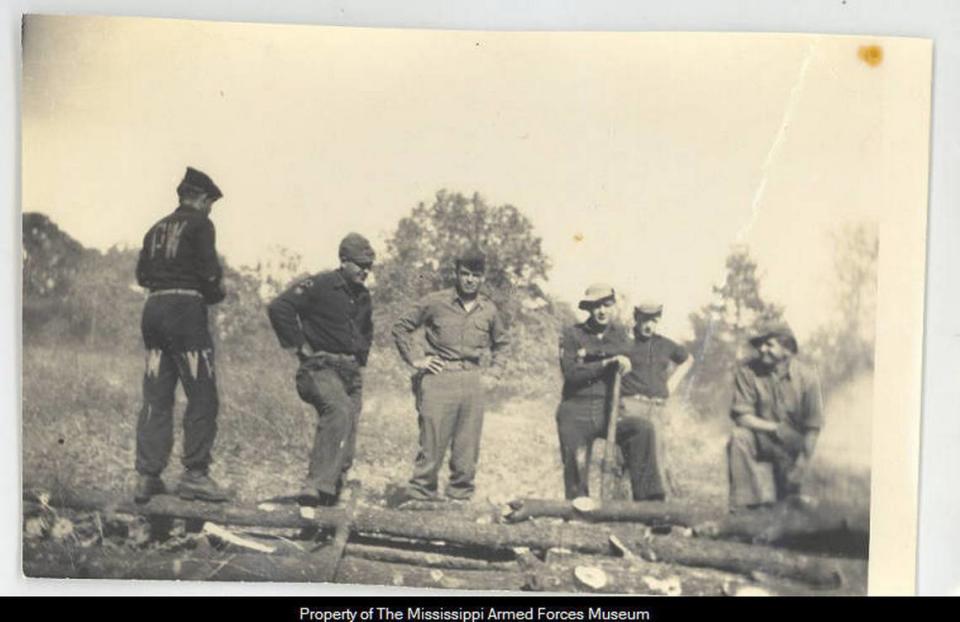 Axis prisoners on or near the coast worked mainly in the lumber industry, harvesting lumber and planting new trees. The P.W. marked on their clothing denotes their status as prisoners of war. Colonel T.B. Birdsong./Mississippi Armed Forces Museum.