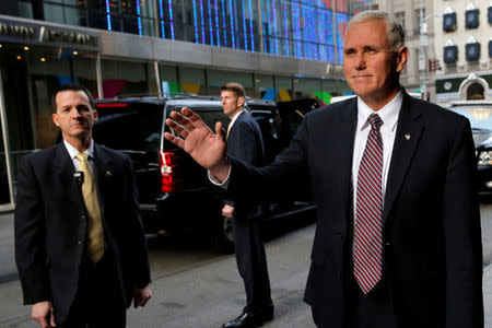 U.S. Vice President-elect Mike Pence arrives at Trump Tower in Manhattan, New York City, U.S. on December 13, 2016. REUTERS/Andrew Kelly/File Photo