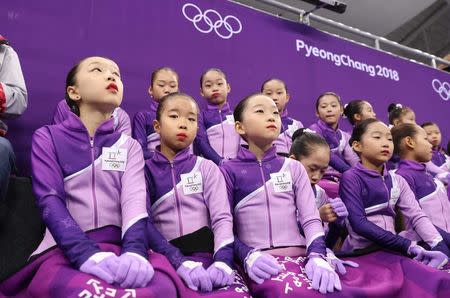 Ice girls, Kang Hae-bin (L-R), Youn Seo-jin and Oh Yu-jin are pictured at Gangneung Ice Arena during the Pyeongchang 2018 Winter Olympics in Pyeongchang, South Korea, February 20, 2018. REUTERS/Lucy Nicholson