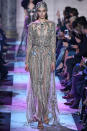 <p>Model wears a semi-sheer crystal and sequin-embroidered dress with matching headpiece from the Elie Saab SS18 Haute Couture show. (Photo: Getty Images) </p>