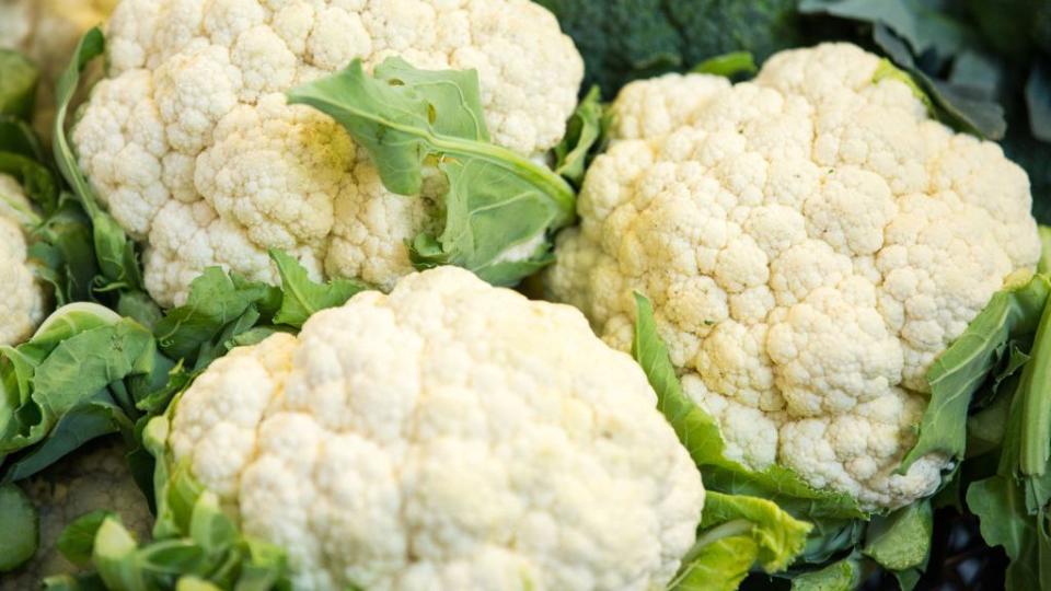 fresh cauliflowers seen displayed on the shelves of wroclaw