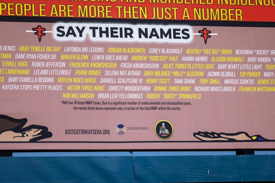 The billboard lists names of people classified as Missing and Murdered Indigenous People in Big Horn County, before a dedication ceremony for a billboard in support of the Missing and Murdered Indigenous People movement on Tuesday, Aug. 29, 2023, along I-90 in Hardin, Mont. (AP Photo/Mike Clark)