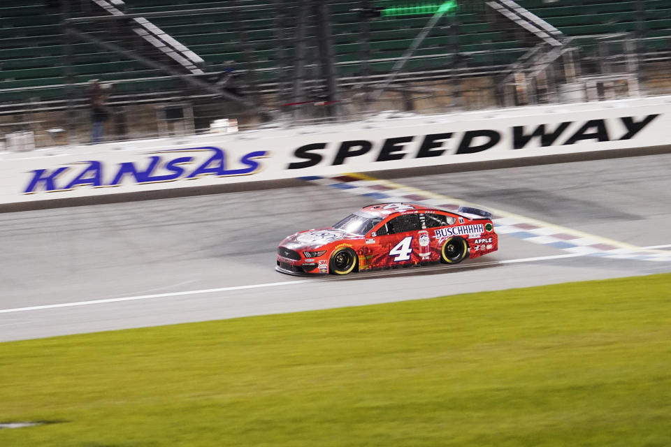 Kevin Harvick drives during a NASCAR Cup Series auto race at Kansas Speedway in Kansas City, Kan., Thursday, July 23, 2020. (AP Photo/Charlie Riedel)