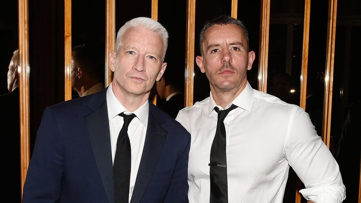 Anderson Cooper and Benjamin Maisani attend the 2015 amfAR Inspiration Gala New York after party at Boom Boom Room on June 16, 2015 in New York City