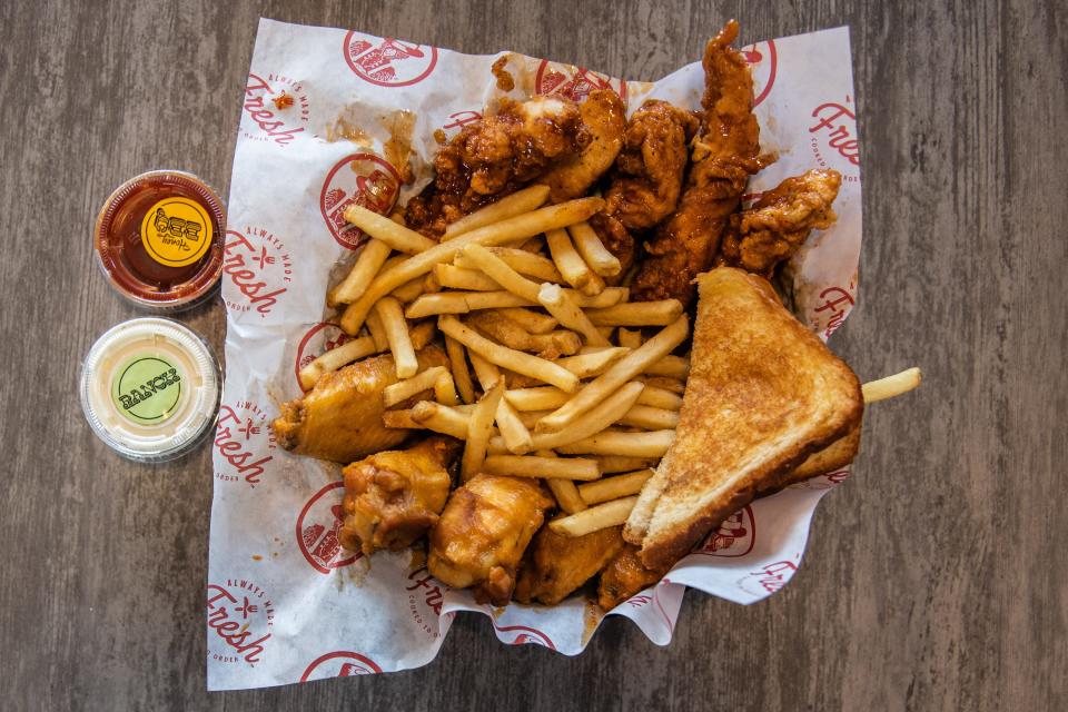 Slim Chickens serves signature chicken tender baskets along with other southern-inspired fare.