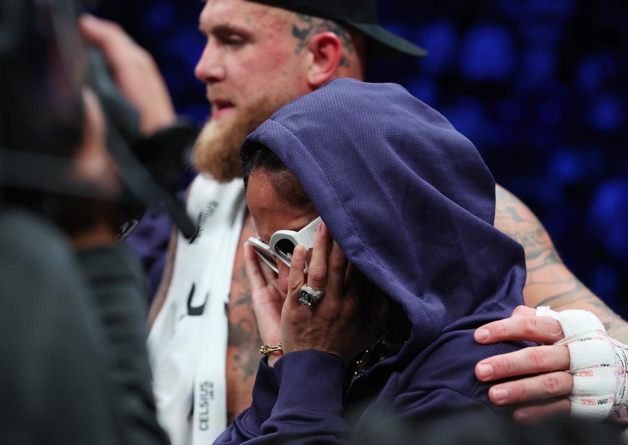 Paul consoles a tearful Amanda Serrano after her bout is cancelled (Getty Images)