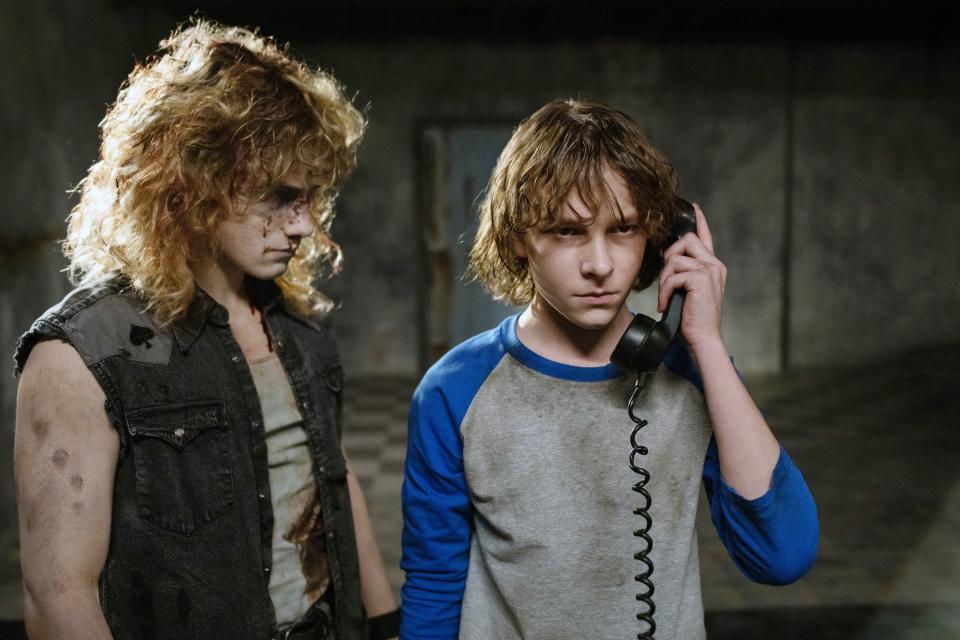 A ghost kid talking to Finney through the phone